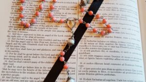 Pink and White Saint Benedict Rosary